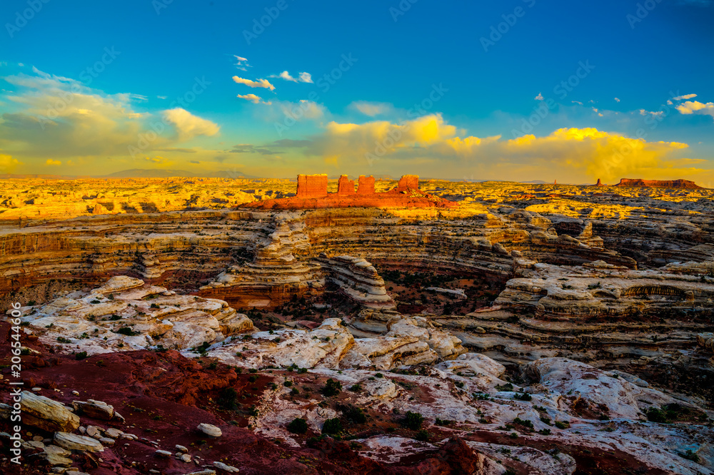 I captured this sunset image from the Maze Overlook in  the remote Maze District of the Canyonlands National Park in Utah. This is an area of rough 4 wheel drive roads and spectacular scenery.