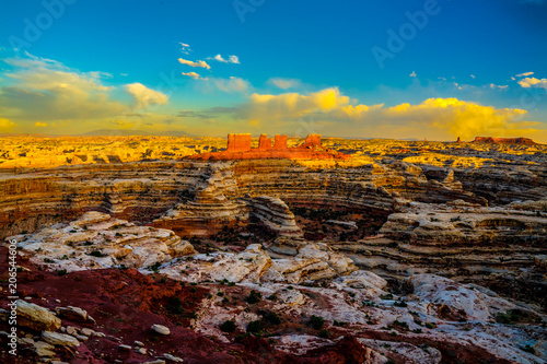 I captured this sunset image from the Maze Overlook in the remote Maze District of the Canyonlands National Park in Utah. This is an area of rough 4 wheel drive roads and spectacular scenery.