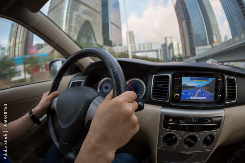 Driving car on city street