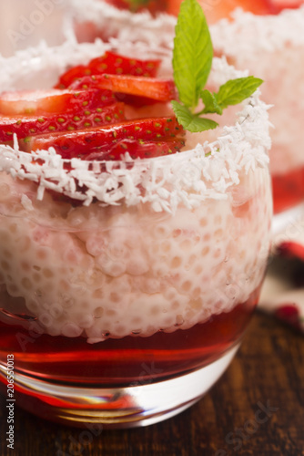A serving of strawberry over tapioca and jelly