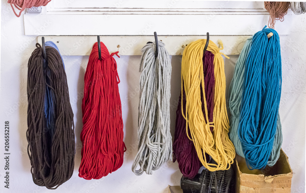 tellen Assortiment Onaangeroerd Stockfoto Yarn used used for weaving Southwestern Native American blankets  on a loom. Town of Chimayó, along the High Road between Santa Fe and Taos,  New Mexico, USA. | Adobe Stock