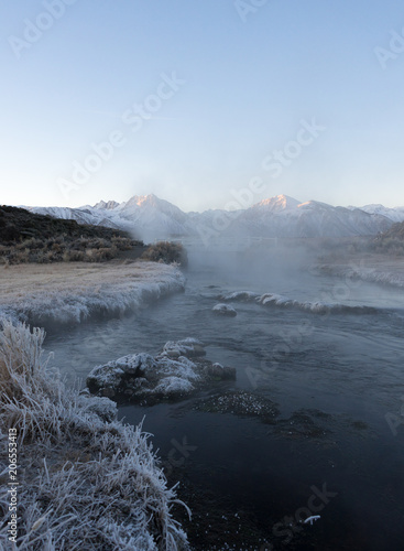 Steam rising from the Hot Creek during a cold winter morning