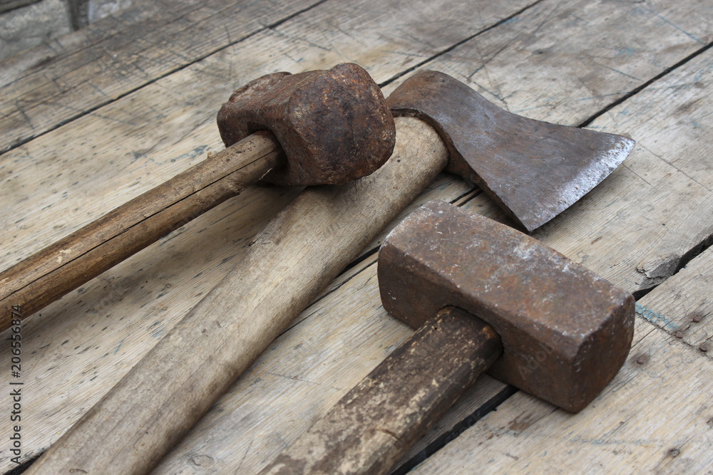 Old hammers and ax Old hammers and ax