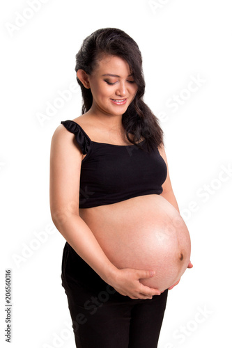 Young pregnant mother isolated