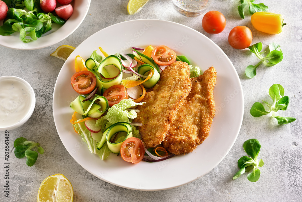 Vegetable salad and schnitzel Vegetable salad and schnitzel