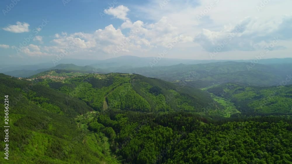Beautiful mountain landscape, with mountain peaks covered with clouds Beautiful mountain landscape, with mountain peaks covered with clouds