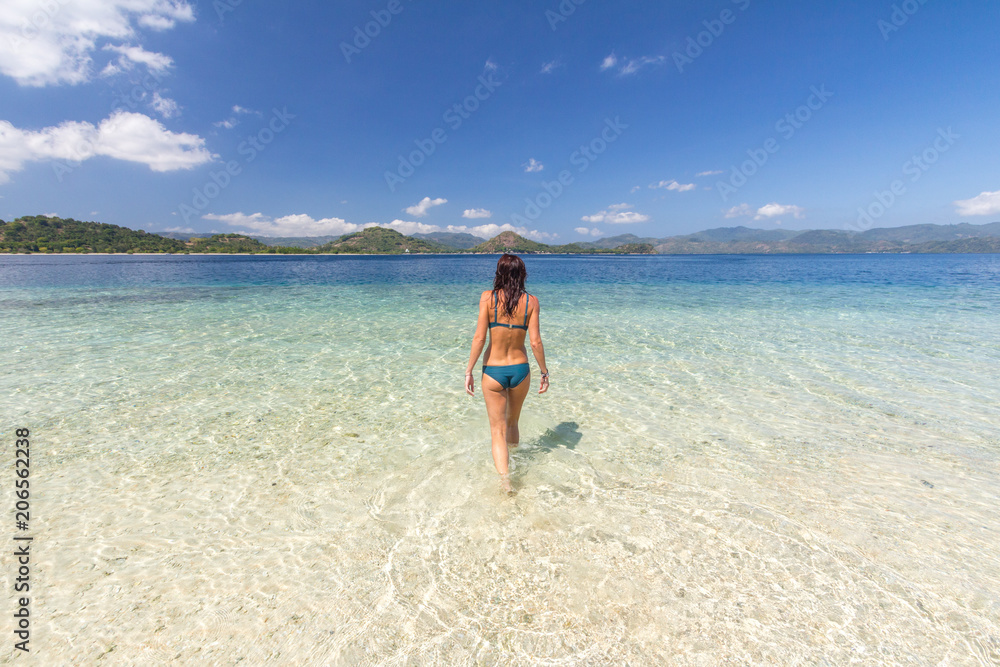 Girl on the beach at Lombok, Indonesia Girl on the beach at Lombok, Indonesia