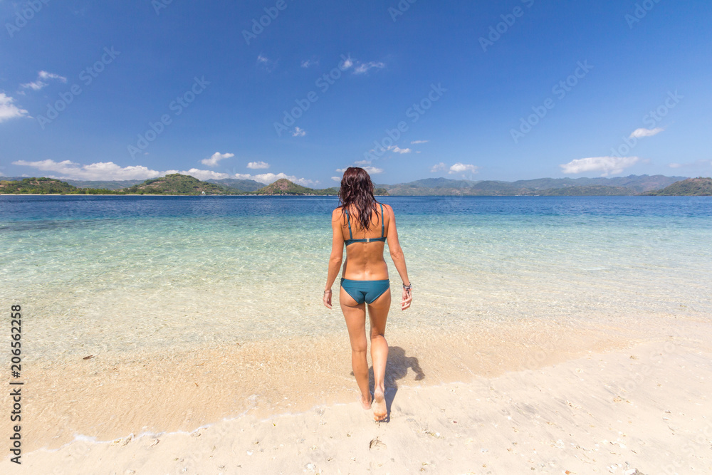 Girl on the beach at Lombok, Indonesia