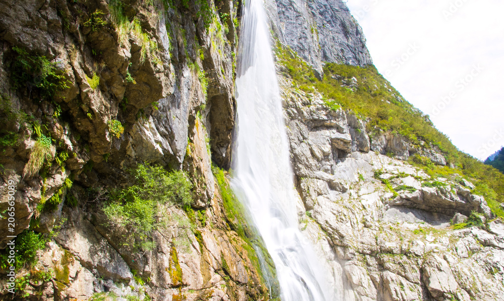 Abkhazia. Water flows out of the rock Abkhazia. Water flows out of the rock