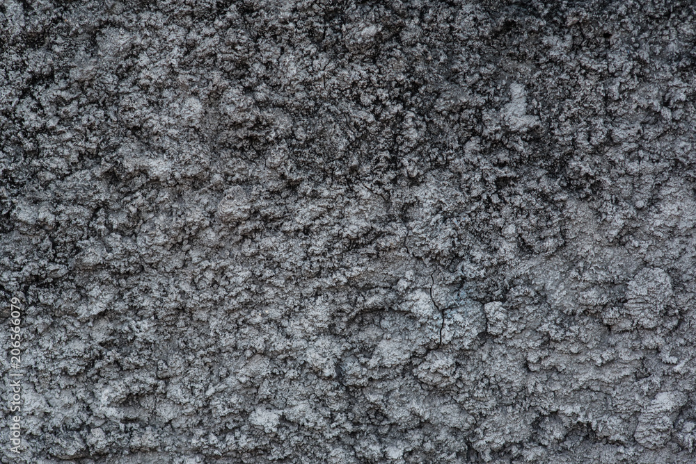 Black cracked cement texture background. Black cracked cement texture background.