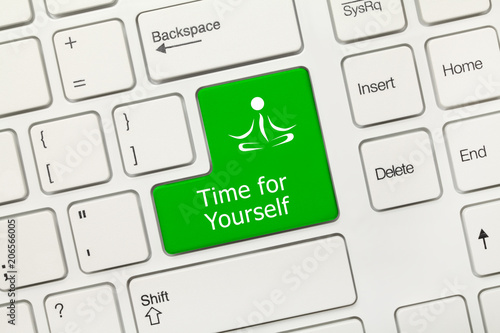 White conceptual keyboard - Time for Yourself (green key) photo