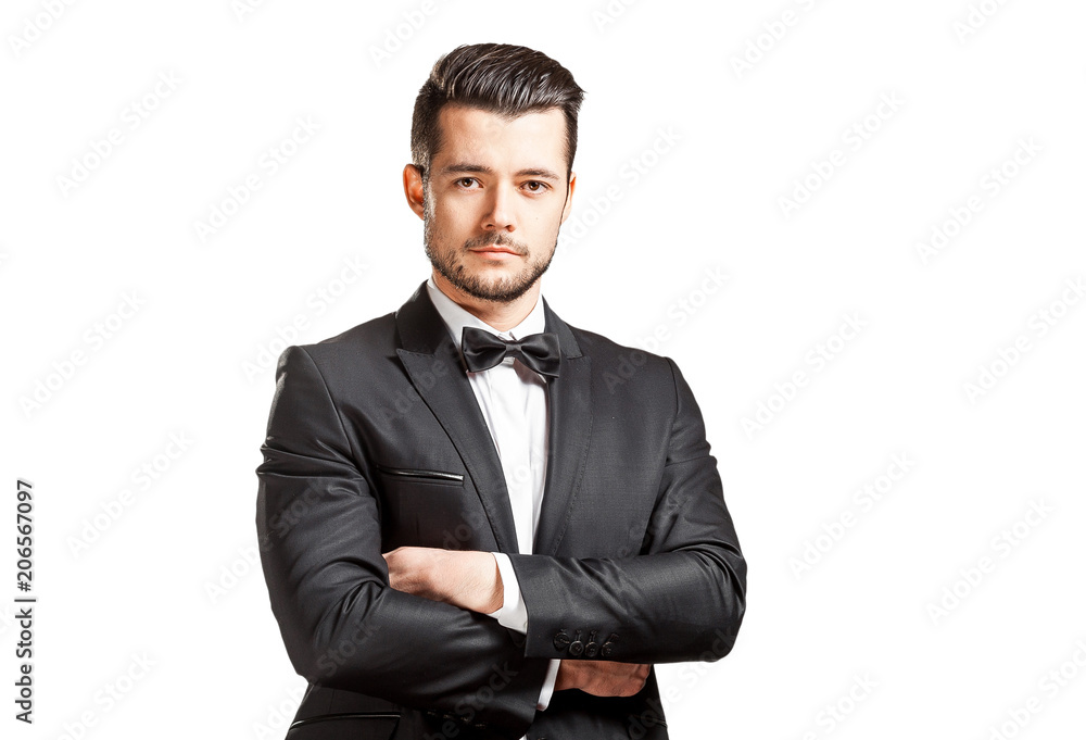 portrait of confident handsome man in black suit with bowtie portrait of confident handsome man in black suit with bowtie