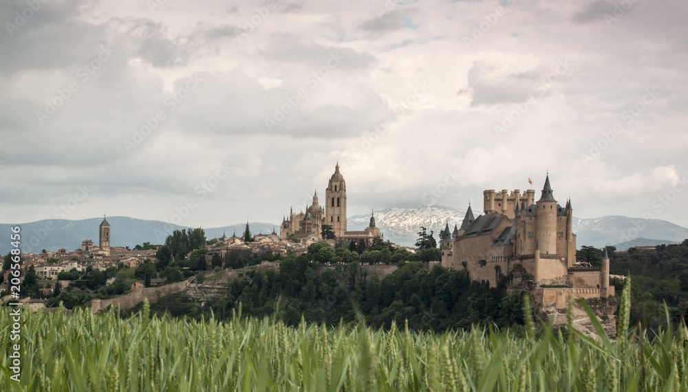 Alcazar castle in Segovia with Peñalara mountain. Castilla y Leon, Spain
