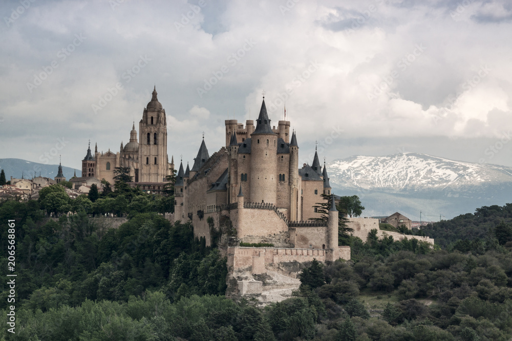 Alcazar castle in Segovia with Peñalara mountain. Castilla y Leon, Spain