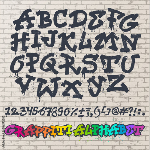 Fototapeta Alfabet graffity wektor alfabetyczne czcionki ABC pociągnięciem pędzla z liter i cyfr lub grunge alfabet typografia ilustracja na białym tle na tle ściany