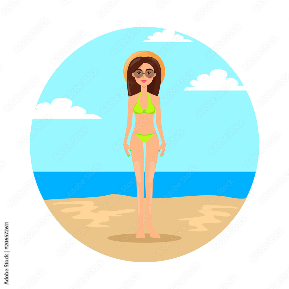 Girl in Green Bikini and Straw Hat Stands on Beach