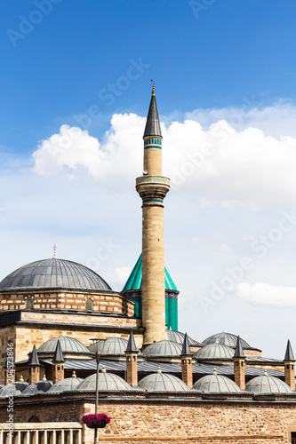 minaret and roofs of Rumi Mausoleum in Konya photo