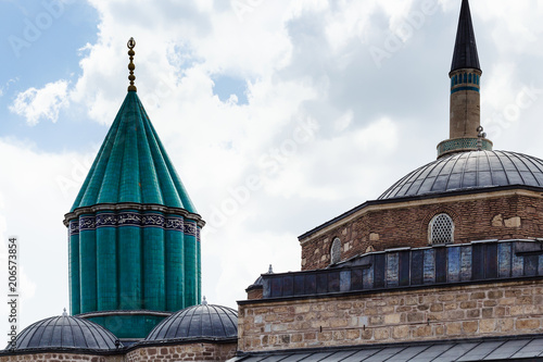 green dome and roof of Rumi Mausoleum in Konya photo