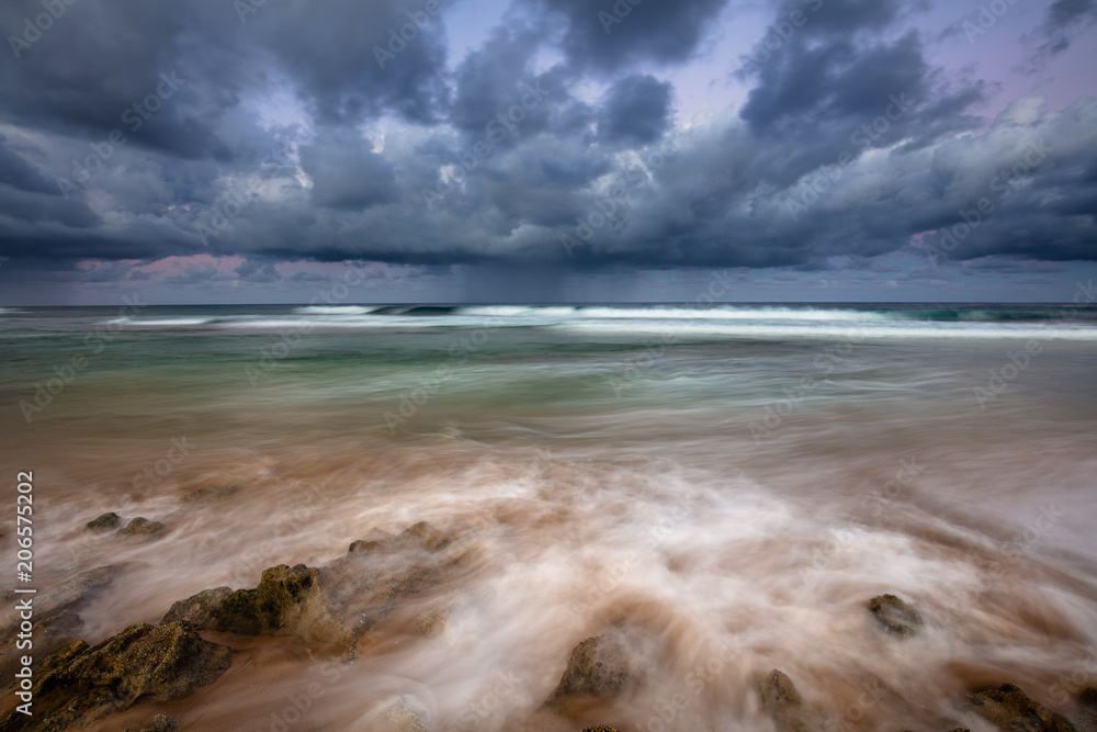 Dramatic storm sky above Indian ocean from beaches of Mozambique