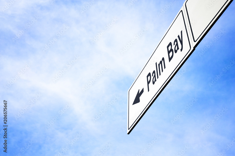Signboard pointing towards Palm Bay