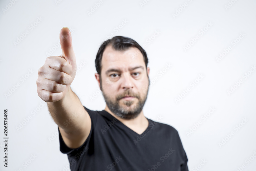 Bearded man tumbs up as congratulate someone Bearded man tumbs up as congratulate someone
