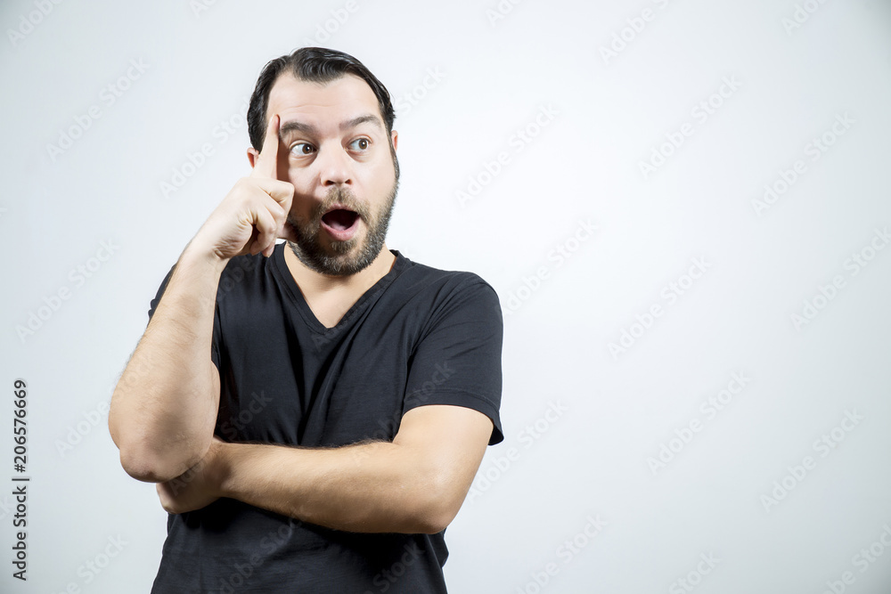 Surprised adult man is looking to the right side Surprised adult man is looking to the right side