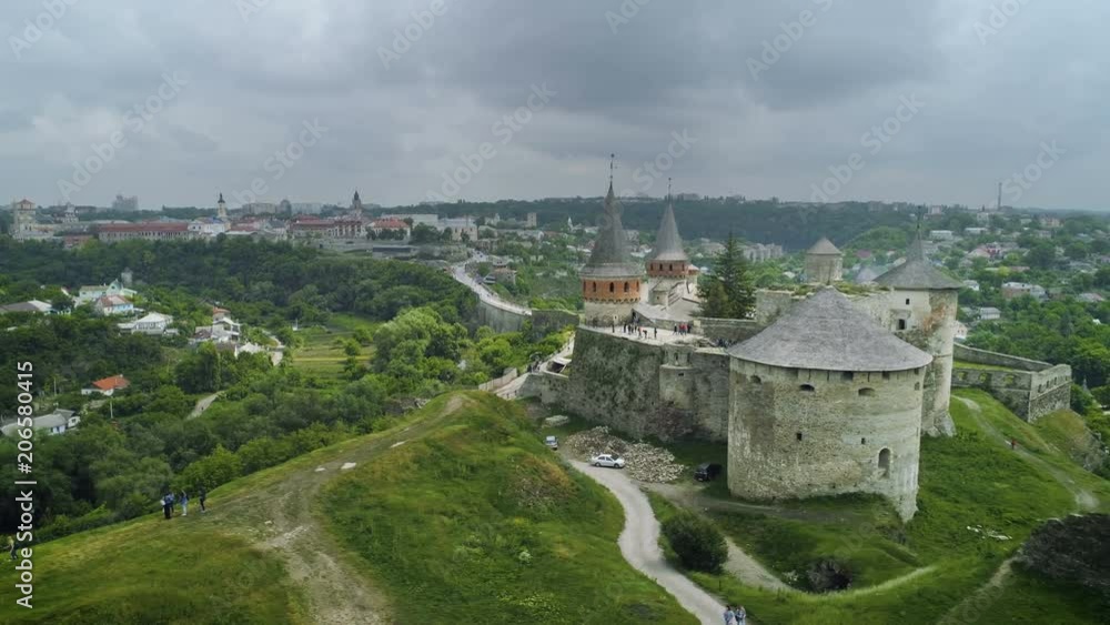 Aerial view of castle with heavy clouds. Rainy weather. Aerial view of castle with heavy clouds. Rainy weather.