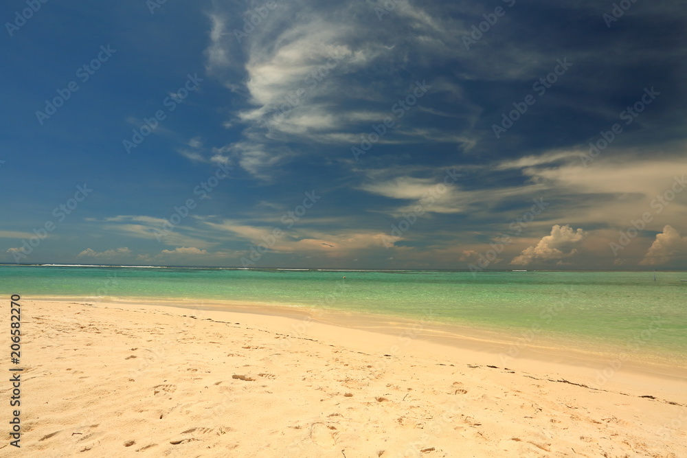 Amazing tropical landscape view. White sand beach , turquoise water and blue sky with white clouds. Horizon line. Maldives, Indian Ocean