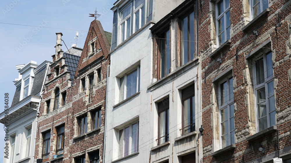 Different old houses in a street in Antwerp, Belgium.