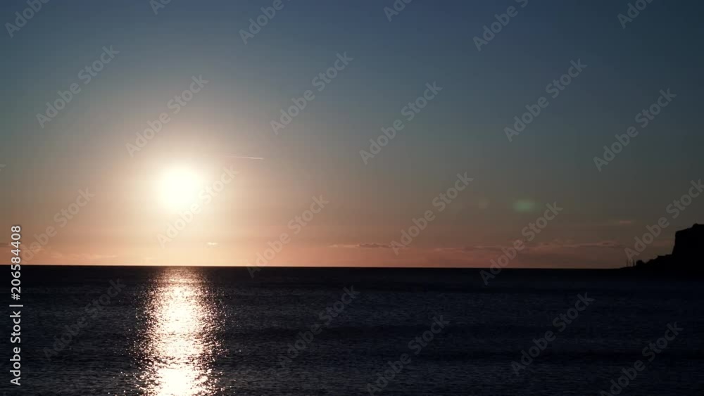 Scenic golden sunset over sea surface, Greece Peloponnese Scenic golden sunset over sea surface, Greece Peloponnese