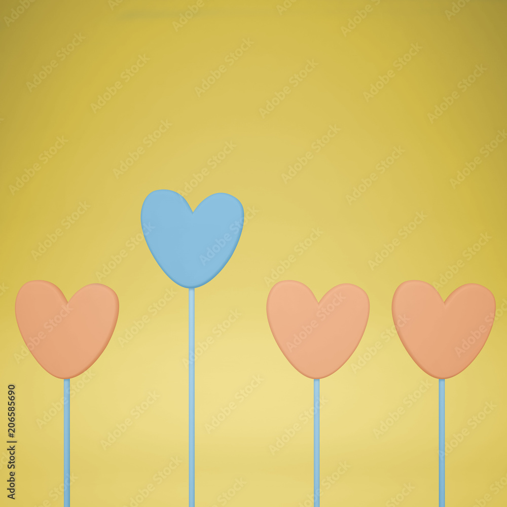 Minimal love and care concept idea, blue and orange heart shape candies on yellow pastel background with copy space Minimal love and care concept idea, blue and orange heart shape candies on yellow pastel background with copy space
