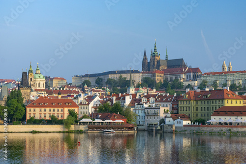 Photography Prague, old buildings along the River over the Charles Bridge