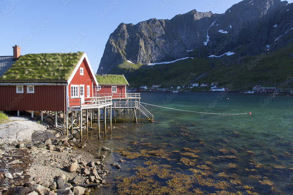 scenery with rorbuer, cottages near reine on lofoten islands, norway