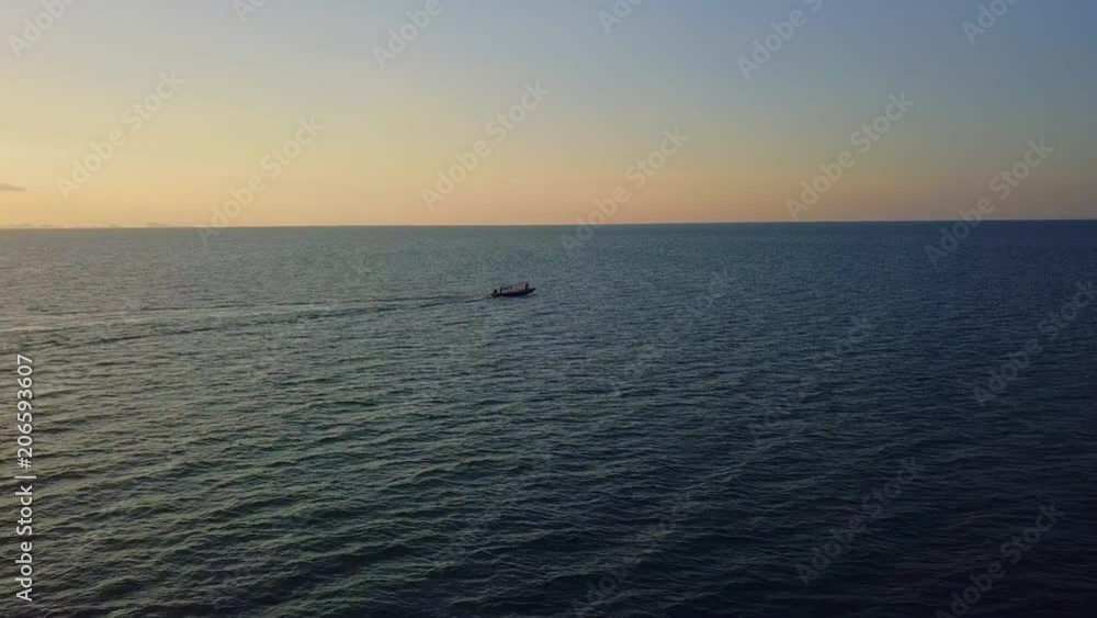 Thailand sunset and the boat on the horizon Thailand sunset and the boat on the horizon