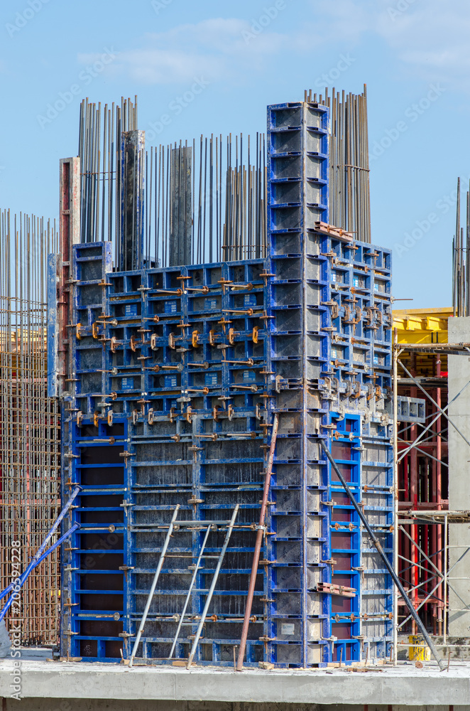 Formwork and scaffolding at the construction site of the new building