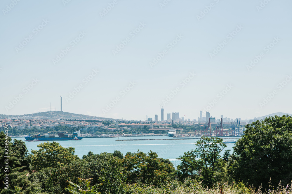 View of the industrial part of Istanbul. Ships, docks and modern cityscape and Bosphorus