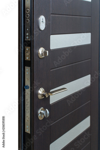 Open armored door. Door lock, Dark brown door closeup. Modern interior design, door handle. New house concept. Real estate.