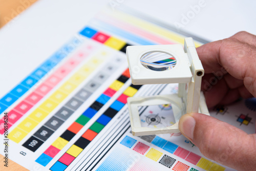 Printing Thread Counter Being Used by Male Hand Measurement Color Management Industry Object photo