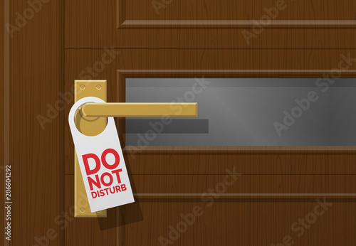 brown wooden door in hotel with sign do not disturb