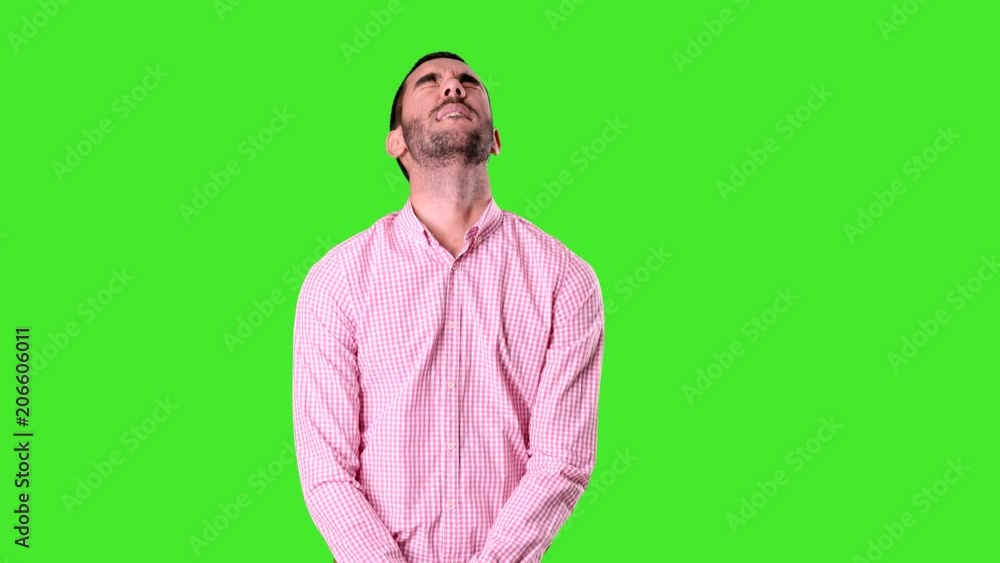 Concerned young man with a gesture of anxiety - Chroma background Concerned young man with a gesture of anxiety - Chroma background