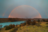 Rainbow at sunrise over the Paine river