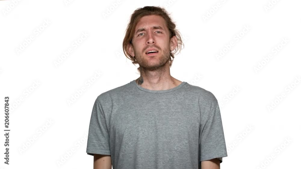 Portrait of begging man in casual clothing whispering god please and looking up with fingers crossed for luck, isolated over white background. Concept of emotions Portrait of begging man in casual clothing whispering god please and looking up with fingers crossed for luck, isolated over white background. Concept of emotions