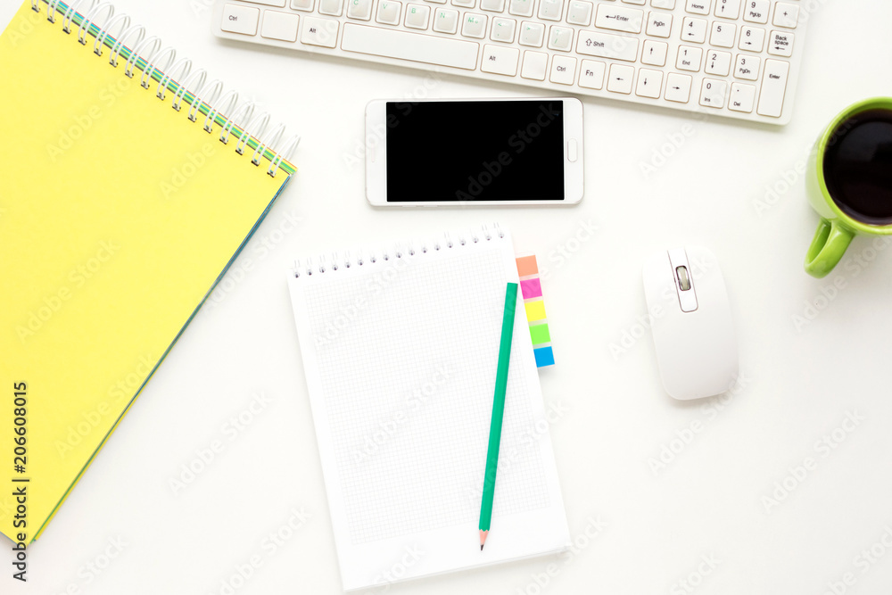 white desk, computer, Cup of coffee, white smart phone lies on the desk, office supplies, white background with copy space, for advertisement, top view white desk, computer, Cup of coffee, white smart phone lies on the desk, office supplies, white background with copy space, for advertisement, top view