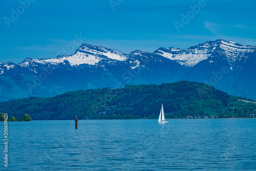 Springtime sailing along the shores of the Upper Zurich Lake (Obersee), Switzerland