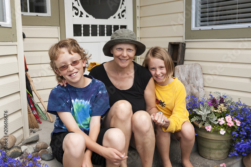 Mom fighting breast cancer with her kids outside