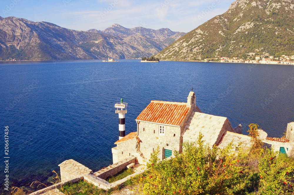 Beautiful autumn Mediterranean landscape. Montenegro, view of Bay of Kotor, Church of Our Lady of the Angels and two small islands (Our Lady of the Rocks and St. George)