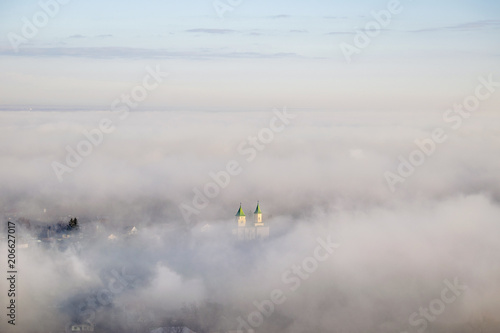 Church in fog from above
