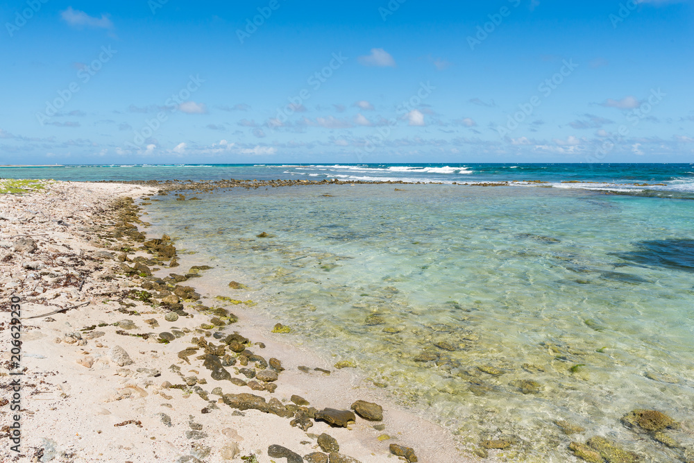 Rocky shoreline of Francisqui island, in Los Roques archipelago, a favorite destination by tourists visiting Venezuela