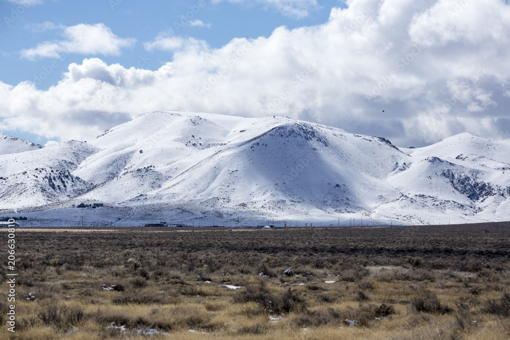 Beautiful mountainous country with snow on the hills in the desert