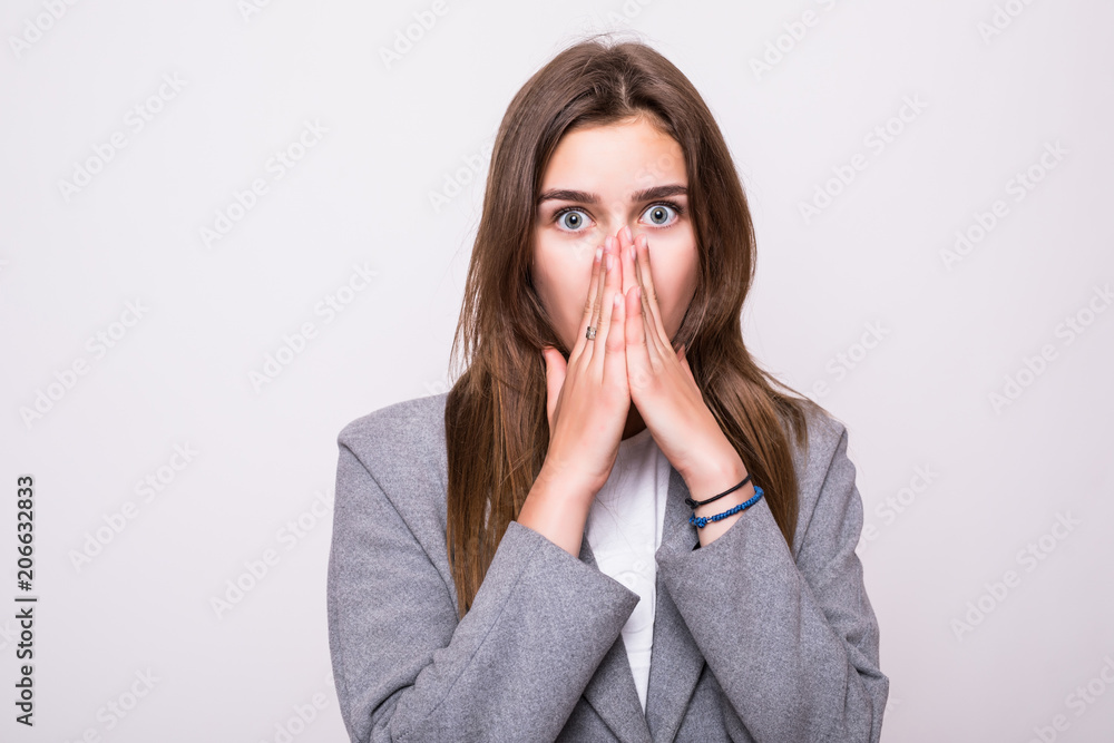 Surprised happy beautiful woman looking sideways in excitement, isolated on white background Surprised happy beautiful woman looking sideways in excitement, isolated on white background